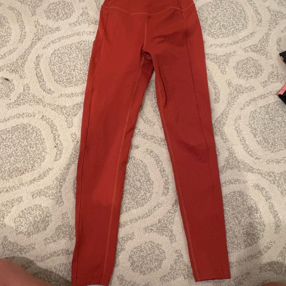 Splits59 Rust Orange Leggings with Pockets